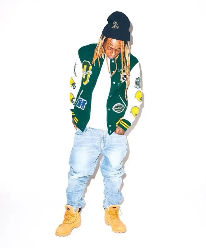 Lil Wayne outfit in NFL, Timberland, and OVO, 2023