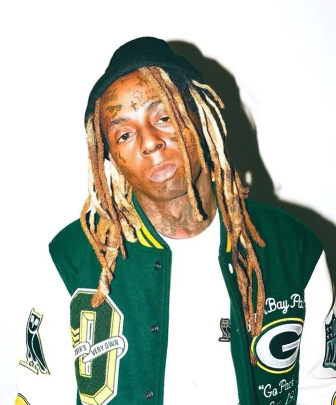 Lil Wayne outfit in NFL, Timberland, and OVO, 2023