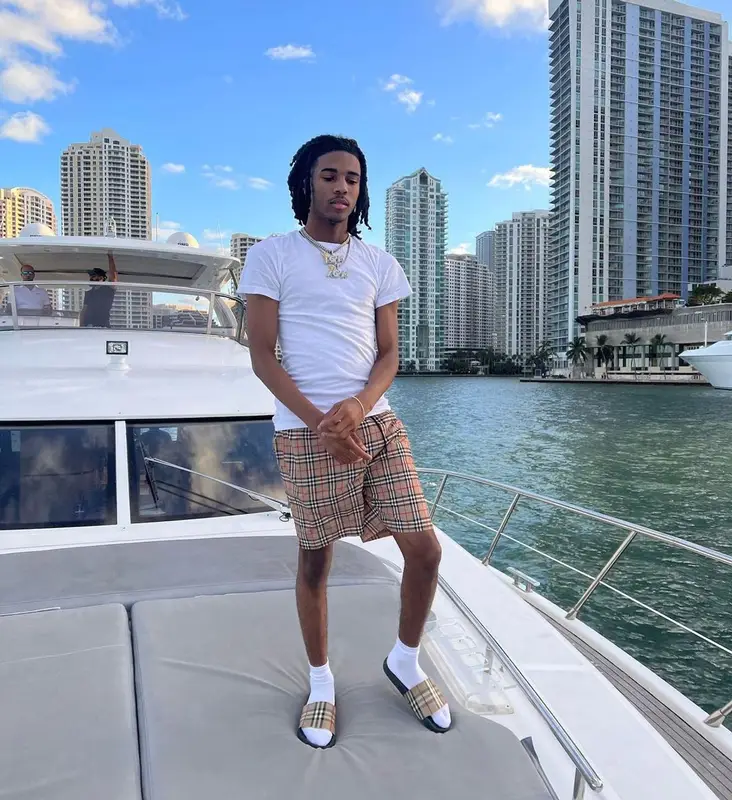 Lil Darius outfit in Polo Ralph Lauren and Burberry, 2023