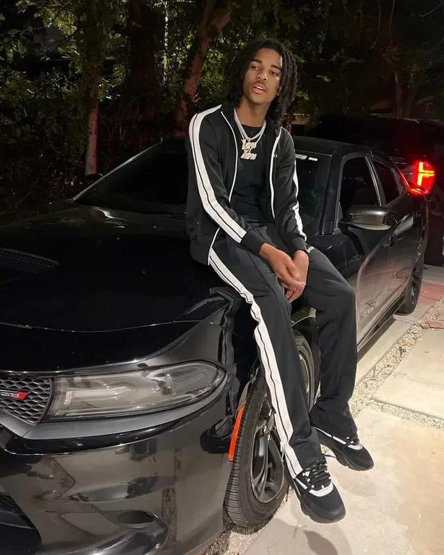 Lil Darius outfit in Palm Angels and Dior, 2023