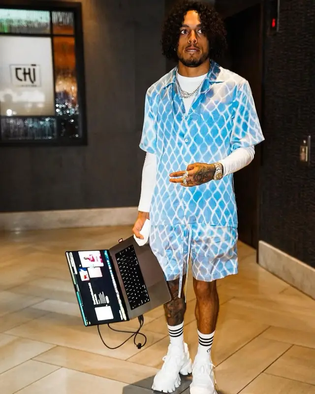 King Cid outfit in Prada, Gucci, and Adidas, 2023