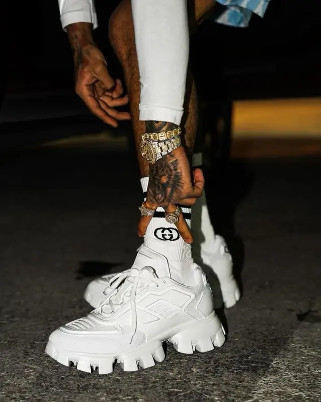 King Cid outfit in Prada, Gucci, and Adidas, 2023
