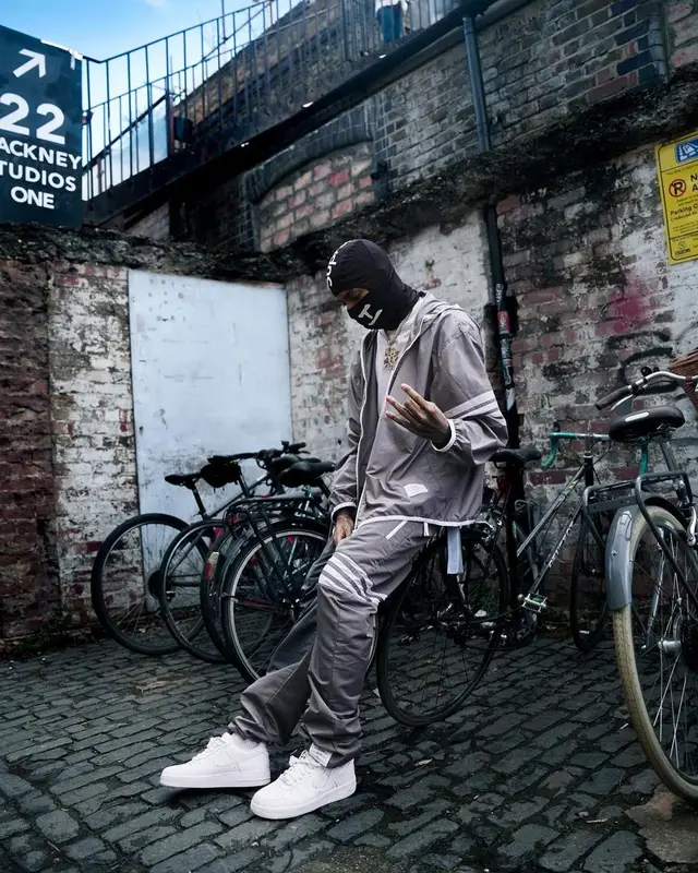 NLE Choppa outfit in Thom Browne, Supreme, and MLB, 2023