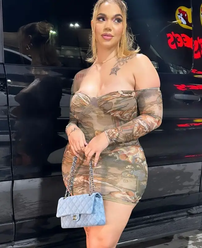 Renni Rucci outfit in Chanel, Louis Vuitton, and Tom Ford, 2023