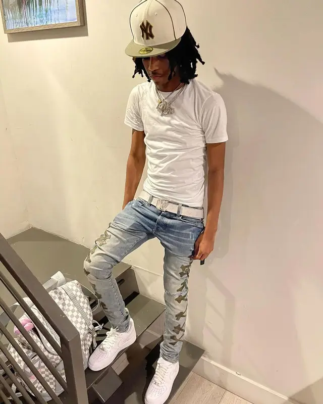 Lil Darius outfit in Hanes, Louis Vuitton, and New Era, 2023