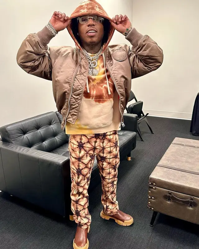 Jacquees outfit in Etudes, Daily Paper, and Gucci, 2023