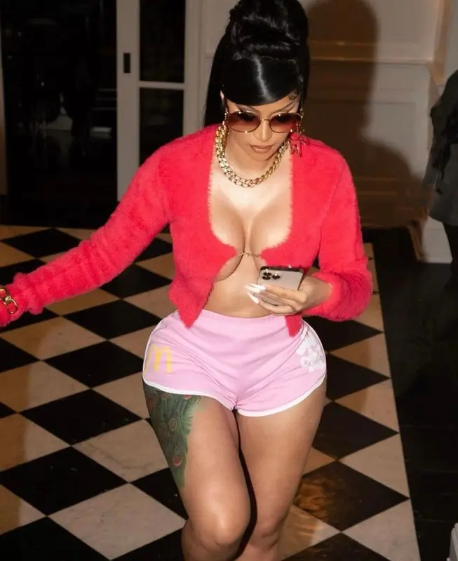 Cardi B outfit in Jacquemus, McDonald's Merch, and Miu Miu, 2023