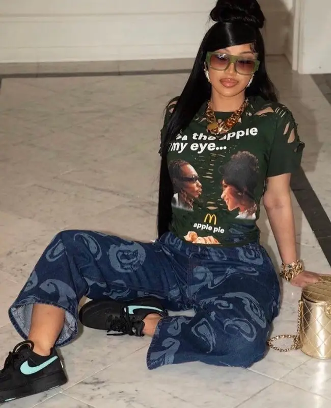 Cardi B outfit in McDonald's Merch, Linda Farrow, and Offset Merch, 2023