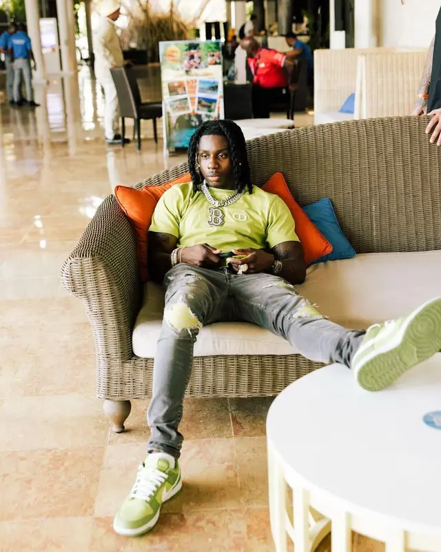 Polo G outfit in Dior, Amiri, and Nike, 2023