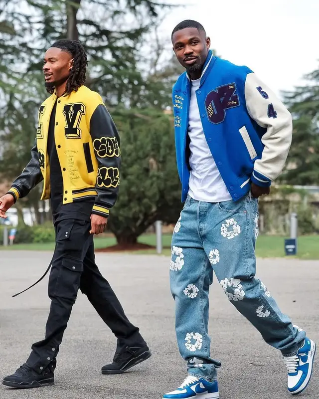 Marcus Thuram outfit in Louis Vuitton, Denim Tears, and Nike, 2023