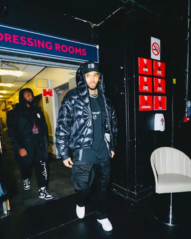 Chris Brown outfit in Moncler, Vetements, and Nike, 2023