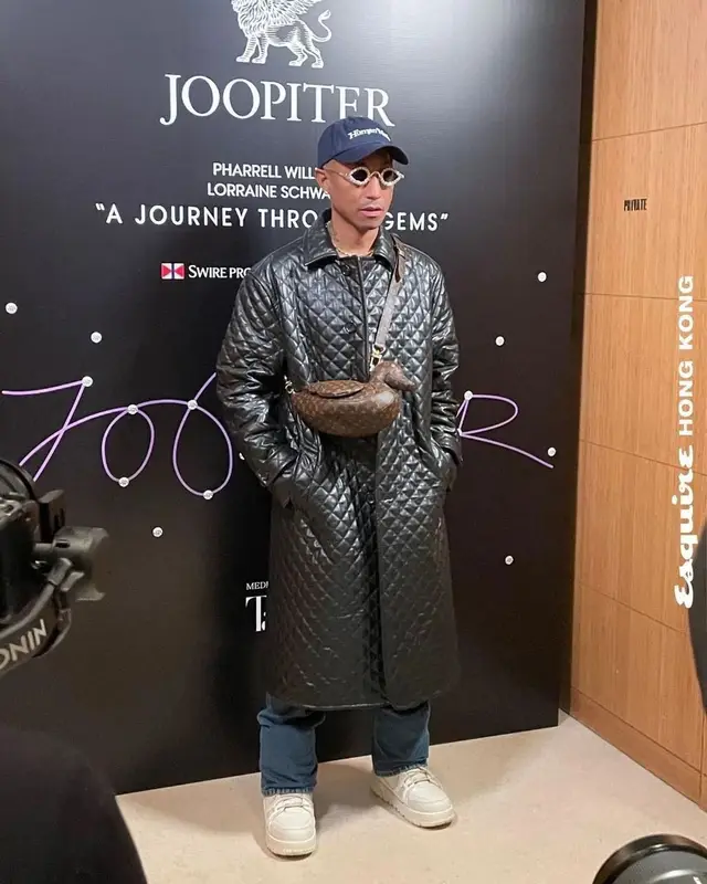 Pharrell Williams outfit in Tiffany&Co, Human Made, and Girls Don't Cry, 2023