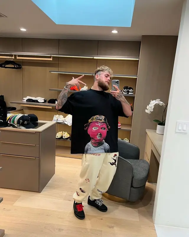 Jake Paul outfit in KidSuper, Travis Scott Merch, and Nike, 2023