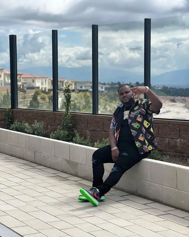 Tee Grizzley outfit in Prada, Amiri, and Nike, 2023