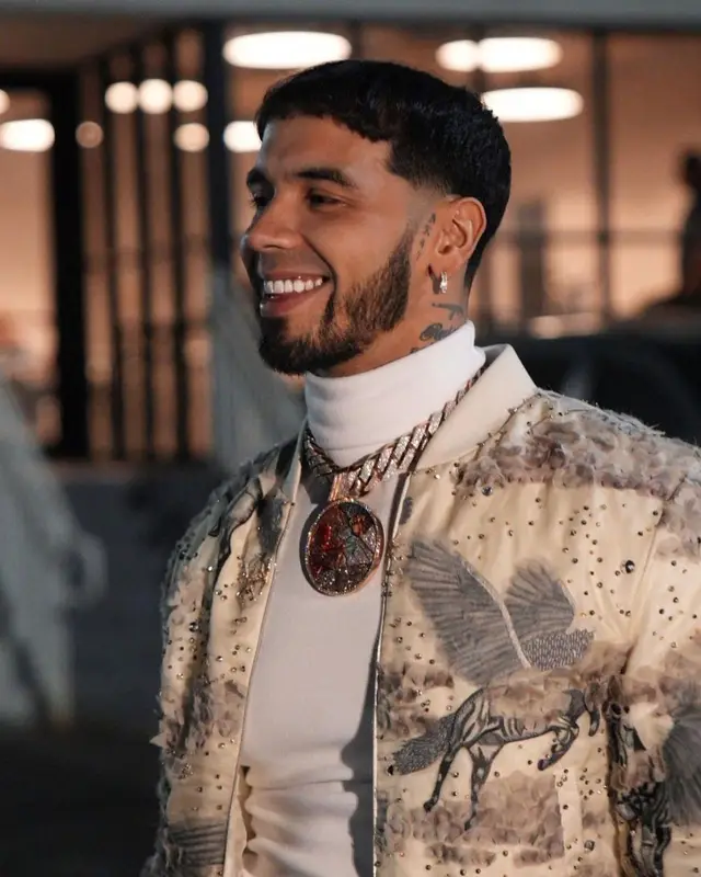 Anuel AA outfit in Amiri, Louis Vuitton, and Dolce & Gabbana, 2023