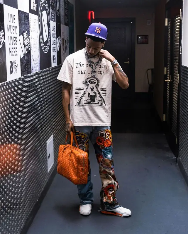 Key Glock outfit in Gallery Dept., Green Acre Exchange, and Jordan, 2023