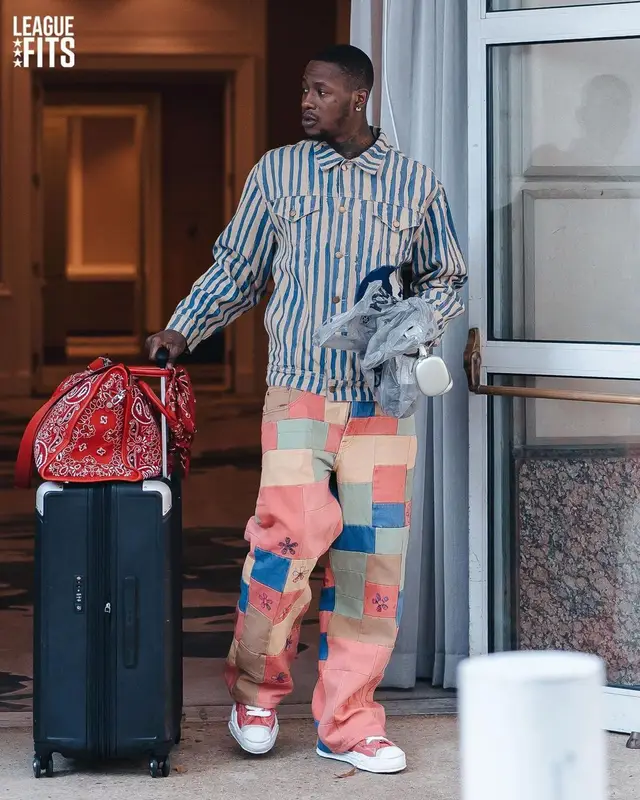 Terry Rozier outfit in KidSuper, Amiri, and Apple, 2023