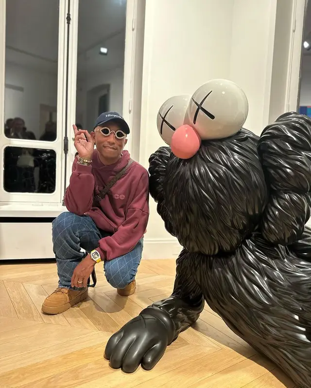 Pharrell Williams outfit in Tiffany&Co, Human Made, and Girls Don't Cry, 2023