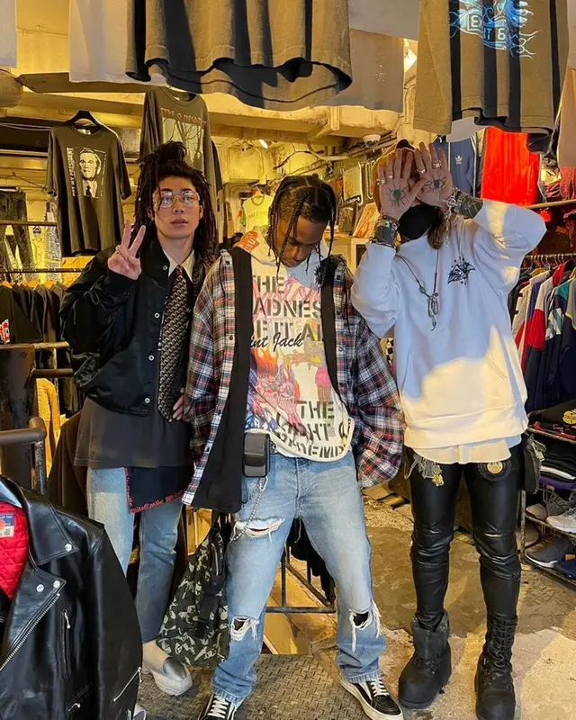 Travis Scott outfit in Balenciaga, Louis Vuitton, and Takashi Murakami, 2023