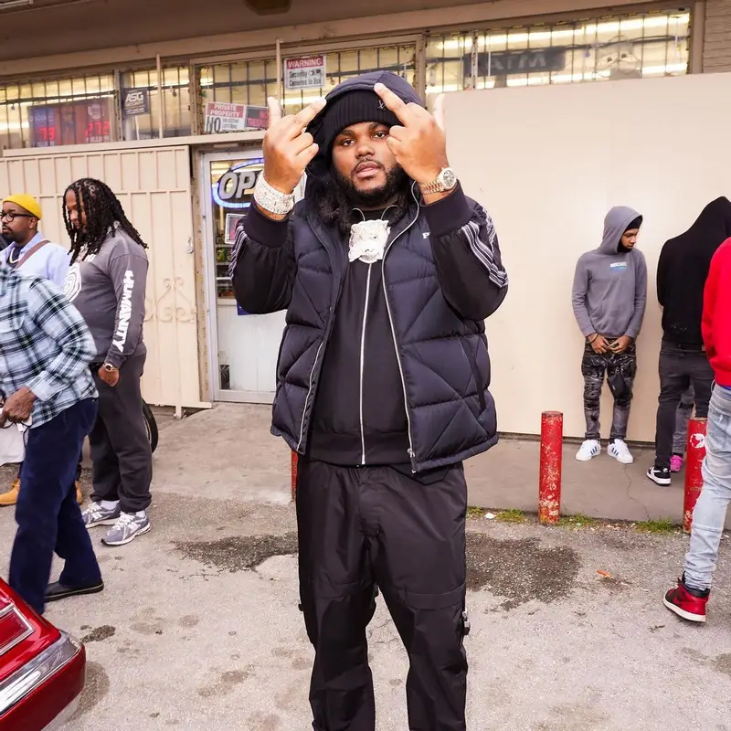 Tee Grizzley outfit in Prada, Givenchy, and Louis Vuitton, 2023