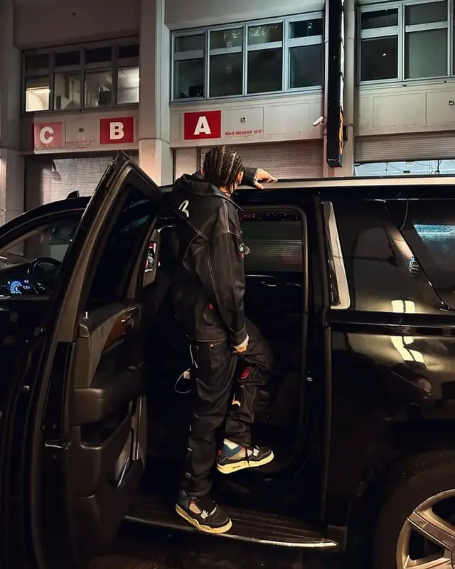 Stunna Gambino outfit in Evisu, Chanel, and Balenciaga, 2023