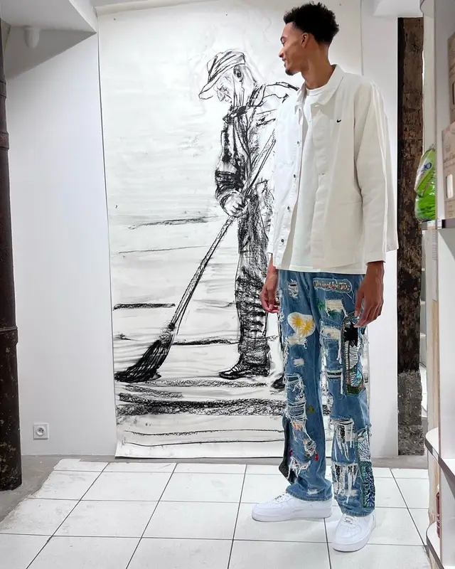 Victor Wembanyama outfit in Nike and Who Decides War, 2023