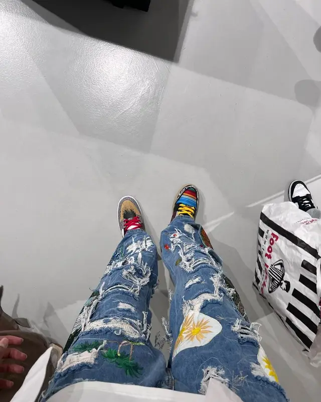 Victor Wembanyama outfit in Nike and Who Decides War, 2023