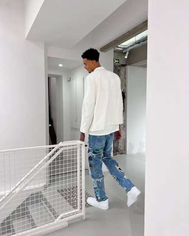 Victor Wembanyama outfit in Nike and Who Decides War, 2023