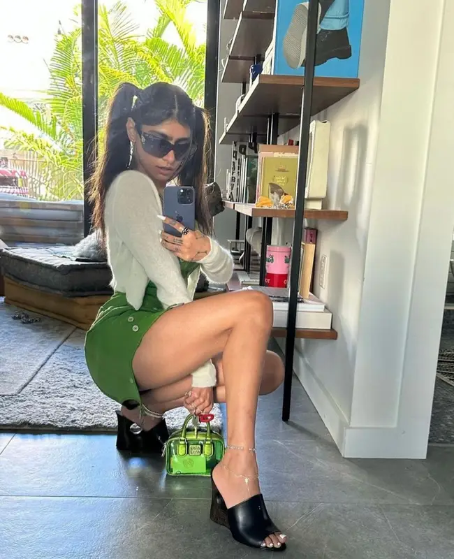Mia Khalifa outfit in Jacquemus, Miu Miu, and Acne Studios, 2023