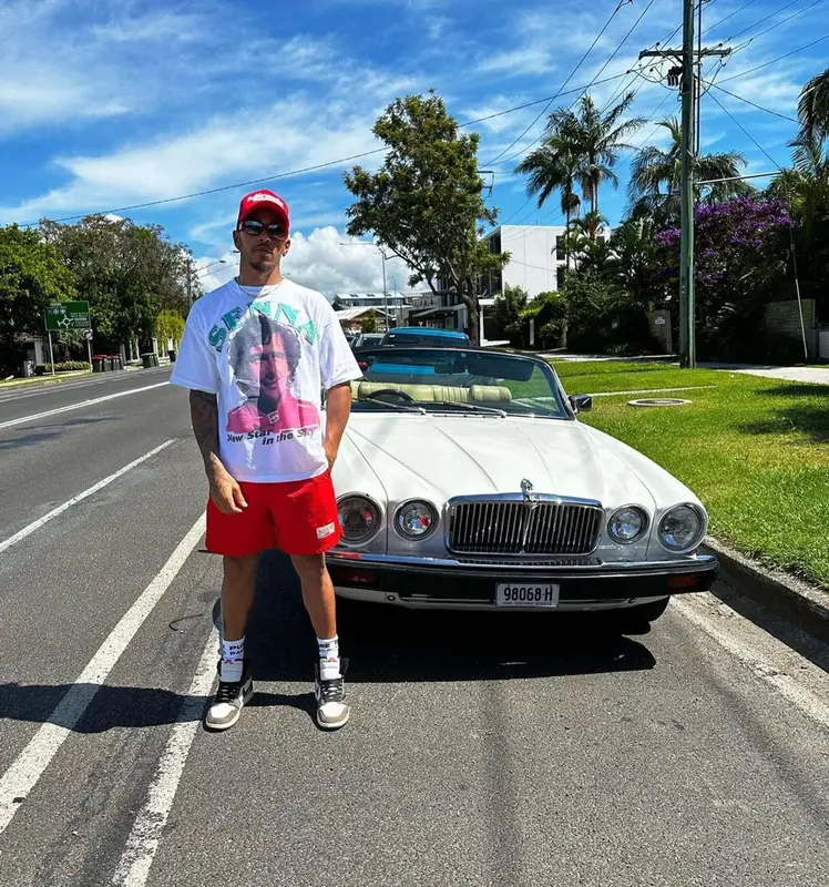Lewis Hamilton outfit in Lewis Hamilton, Nike, and Travis Scott Merch, 2023