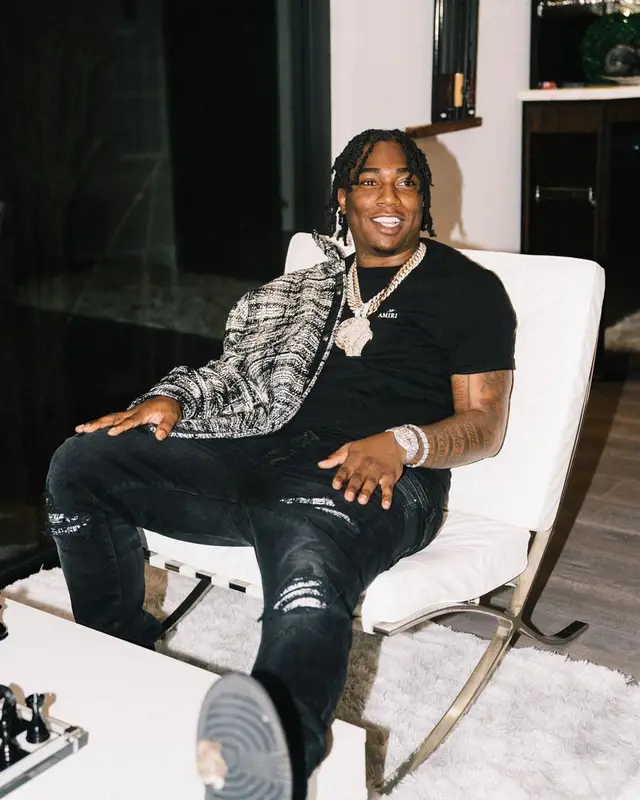 Fredo Bang outfit in Amiri, Nike, and Travis Scott Merch, 2023