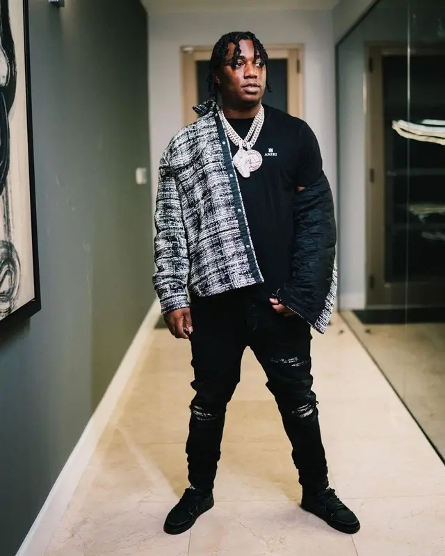 Fredo Bang outfit in Amiri, Nike, and Travis Scott Merch, 2023