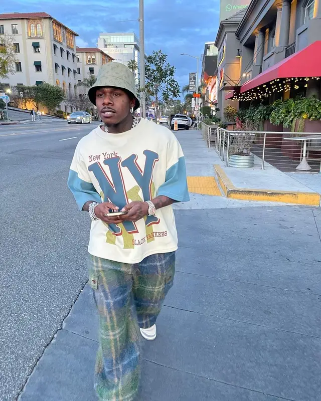 DaBaby outfit in Black Angels In Flight, Jordan, and Louis Vuitton, 2023