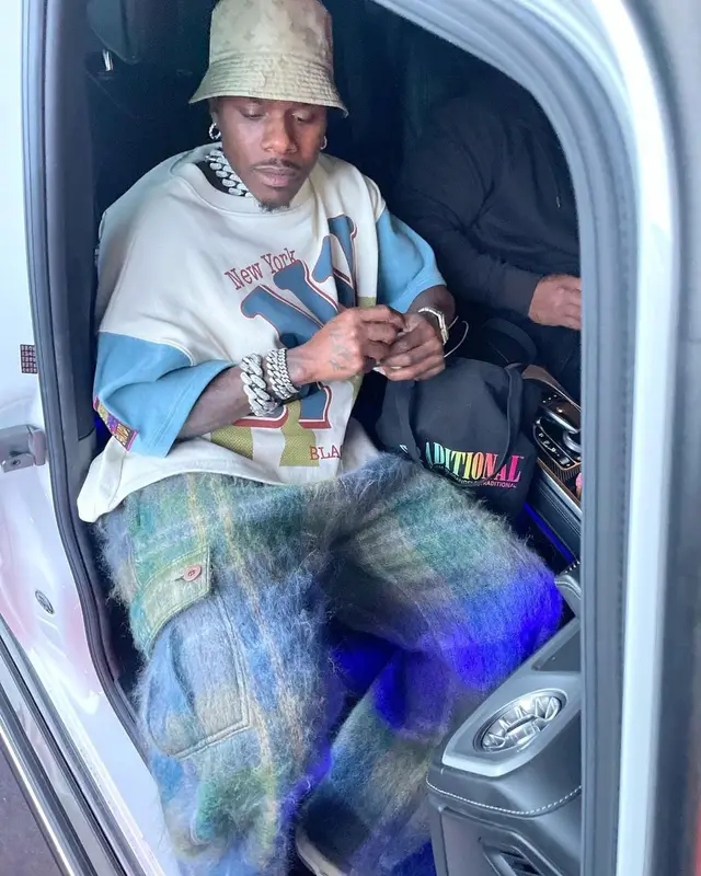 DaBaby outfit in Black Angels In Flight, Jordan, and Louis Vuitton, 2023