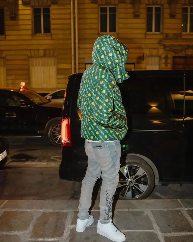 Victor Osimhen outfit in Moncler, Amiri, and Palm Angels, 2023