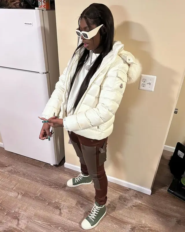 Mello Buckzz outfit in Moncler, Rhude, and Amiri, 2023