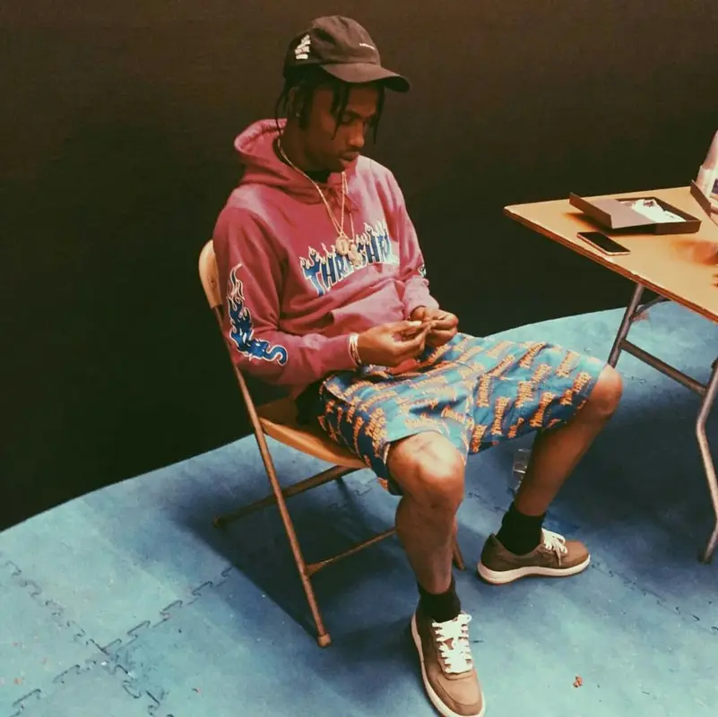 Travis Scott outfit in Supreme, Undefeated, and Anti Social Social Club, 2015