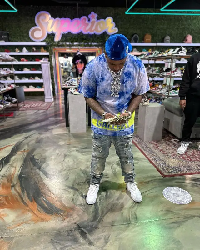 Finesse2tymes outfit in Gallery Dept., Supreme, and New Era, 2023