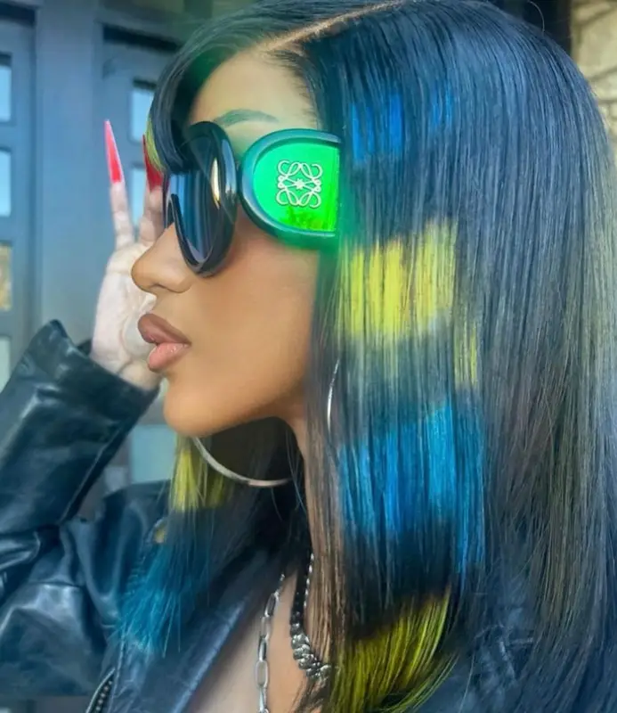 Cardi B outfit in Urban Outfitters, AG Jeans, and Loewe, 2023