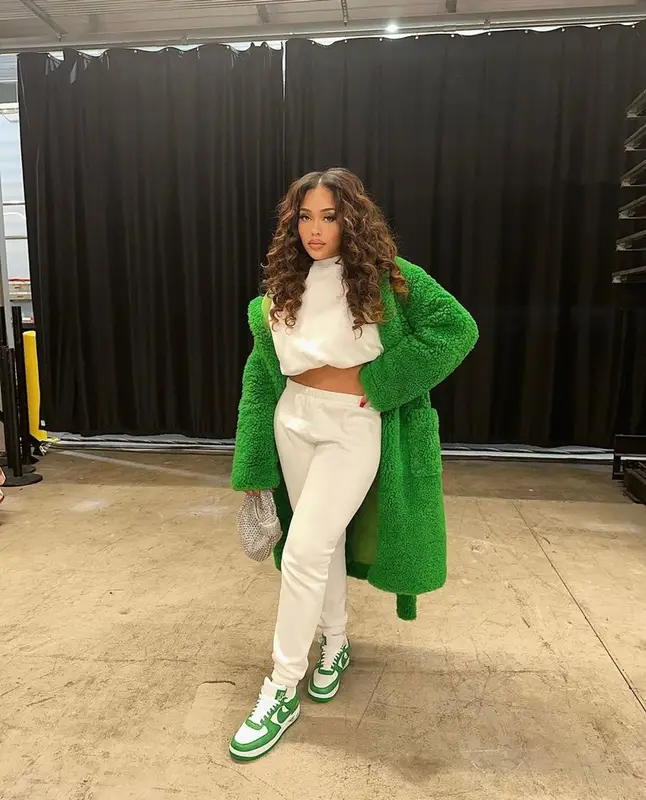 Jordyn Woods outfit in Bottega Veneta, Louis Vuitton, and Nike, 2023