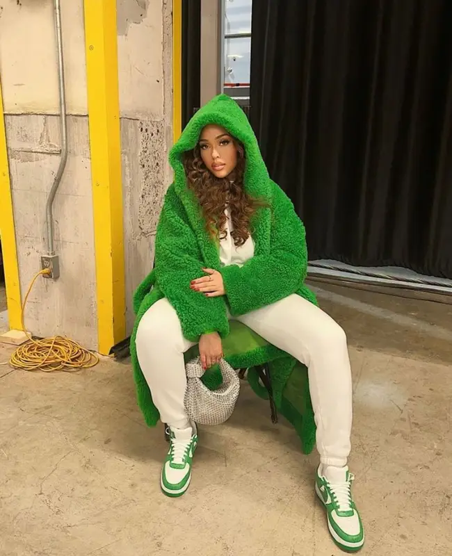 Jordyn Woods outfit in Bottega Veneta, Louis Vuitton, and Nike, 2023