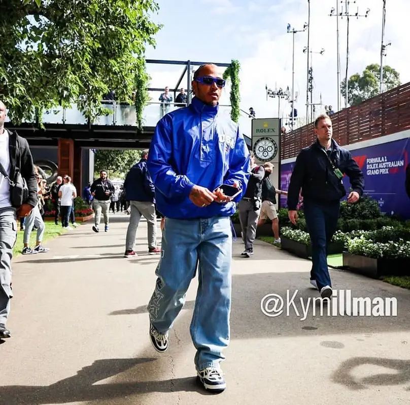 Lewis Hamilton outfit in Tommy Hilfiger, Louis Vuitton, and Vuarnet, 2023