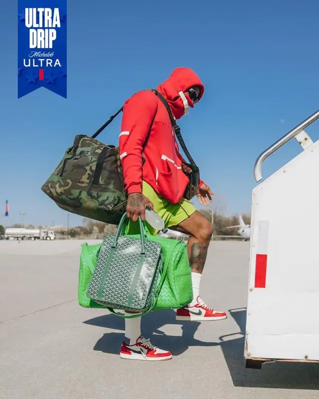 PJ Tucker outfit in Goyard, Louis Vuitton, and Bottega Veneta, 2023