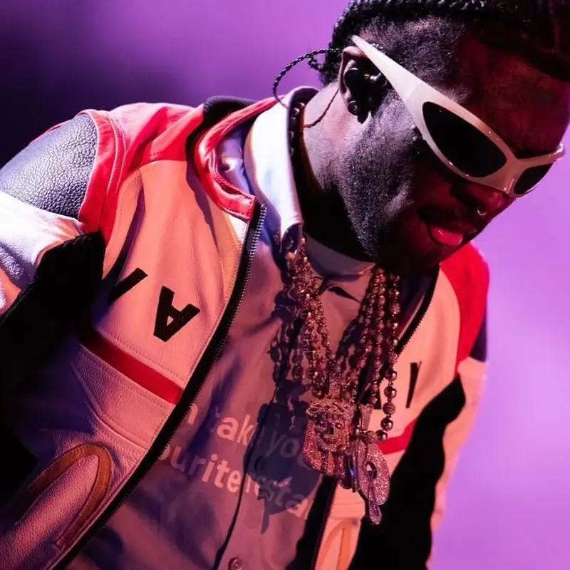Lil Uzi Vert outfit in McDonald's Merch, Nike, and Balenciaga, 2023