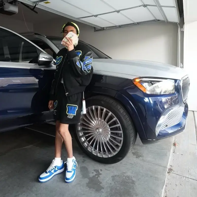 Lil Poppa outfit in Off-White, Louis Vuitton, and Carhartt, 2023