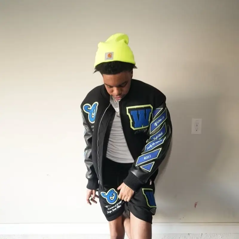 Lil Poppa outfit in Off-White, Louis Vuitton, and Carhartt, 2023