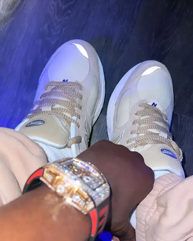 Lil Tjay outfit in Heron Preston, New Balance, and Rhude, 2023
