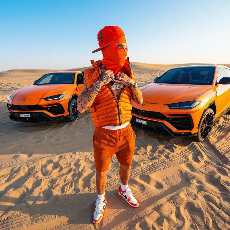 Sfera Ebbasta outfit in Stone Island, Cartier, and Supreme, 2023
