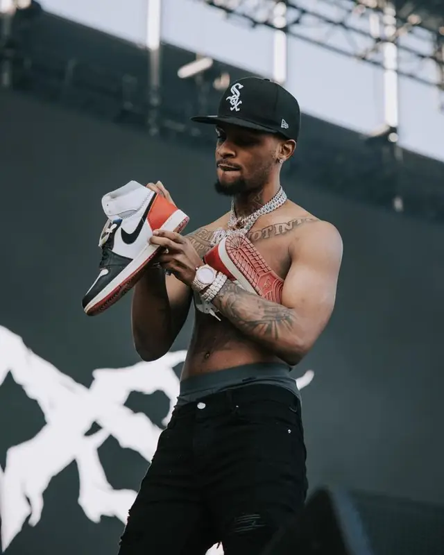 Toosii outfit in Amiri, New Era, and Jordan, 2023