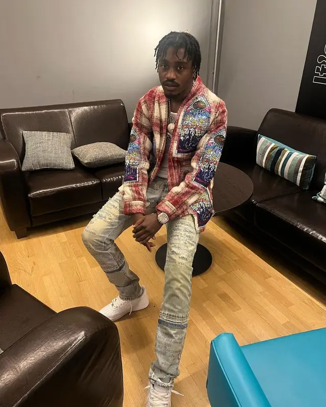 Lil Tjay outfit in Who Decides War and Nike, 2023